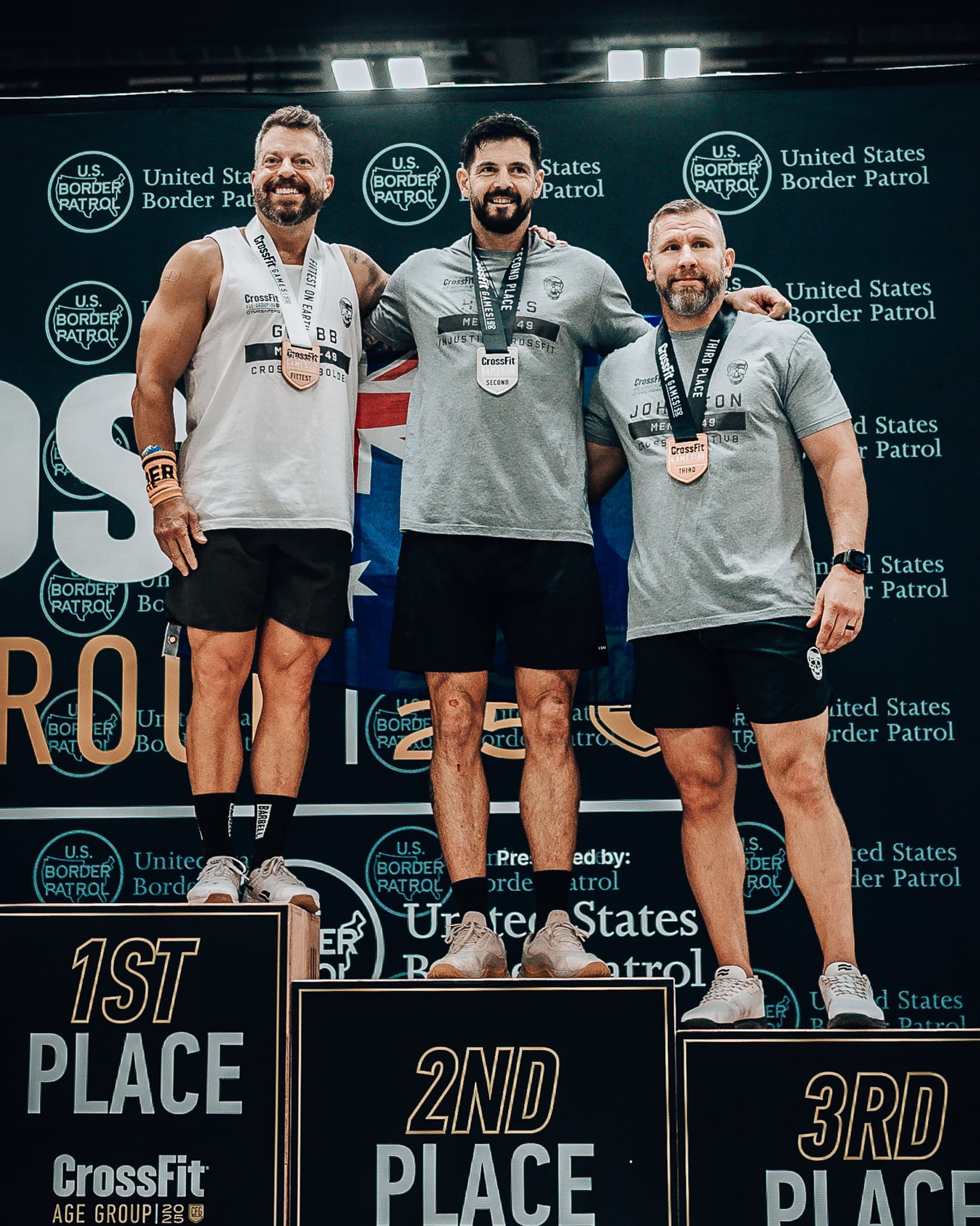 Jason Grubb on the podium at the CrossFit Games
